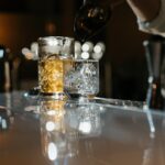 How to Tell the Difference between spirits with two glasses on a bar