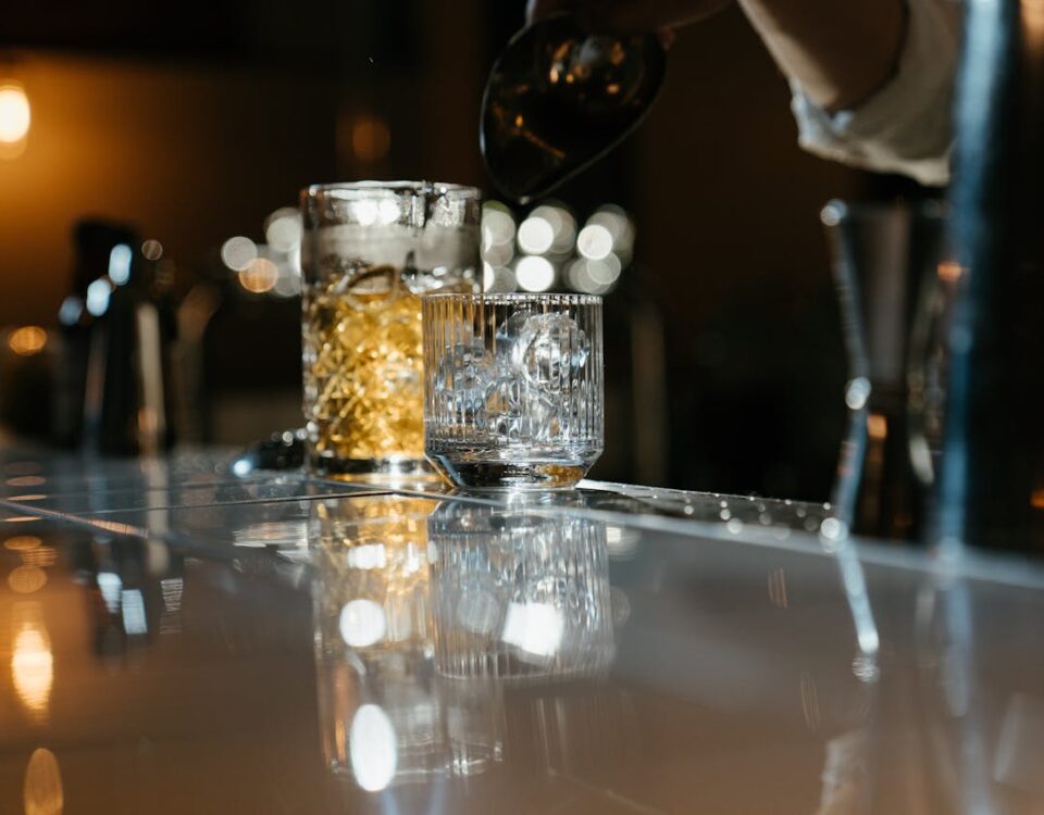 How to Tell the Difference between spirits with two glasses on a bar
