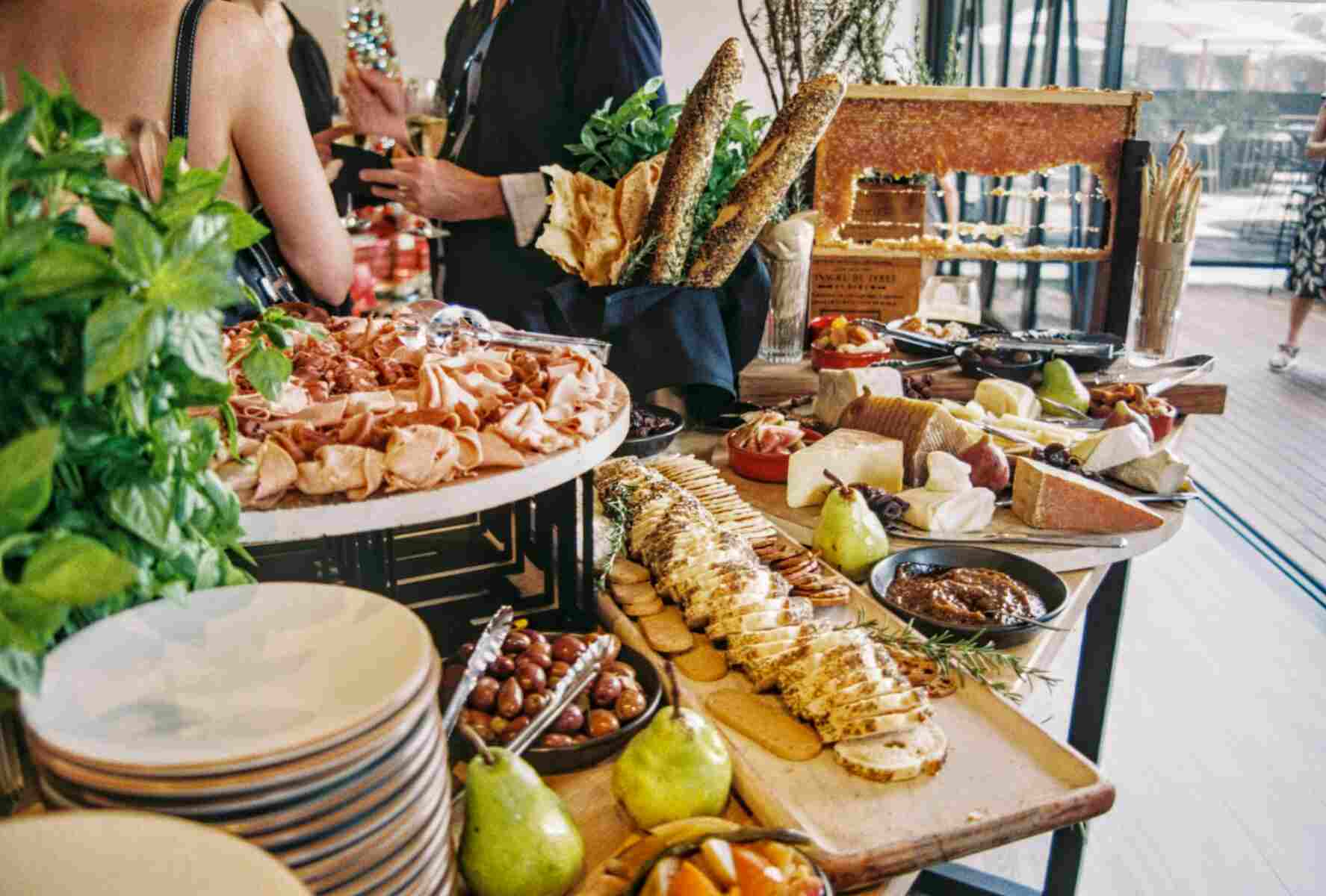 Table with assorted platters illustrating Event Essentials
