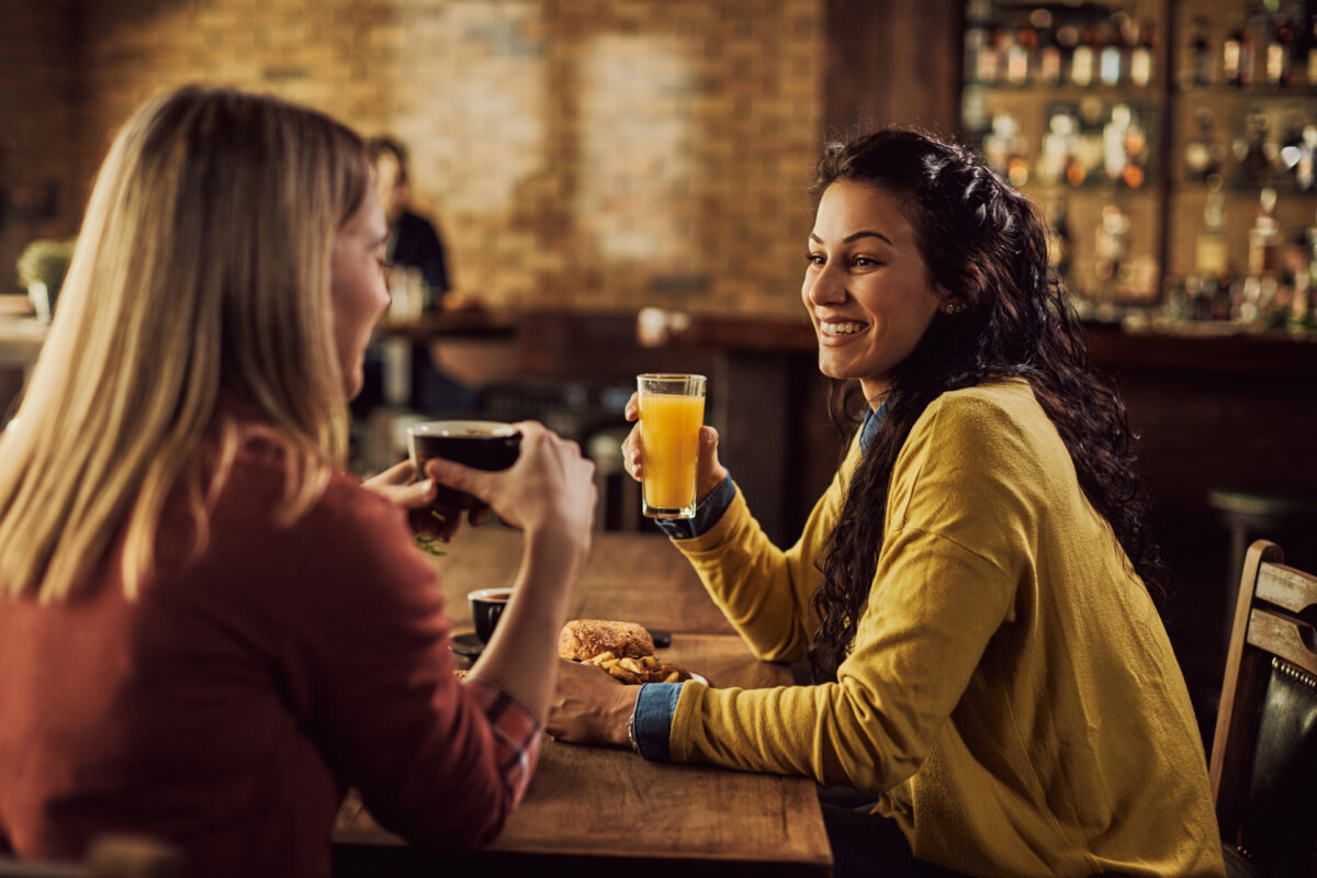 Families enjoying a relaxed Mother’s Day lunch together at The Highway Pub in a warm, welcoming setting