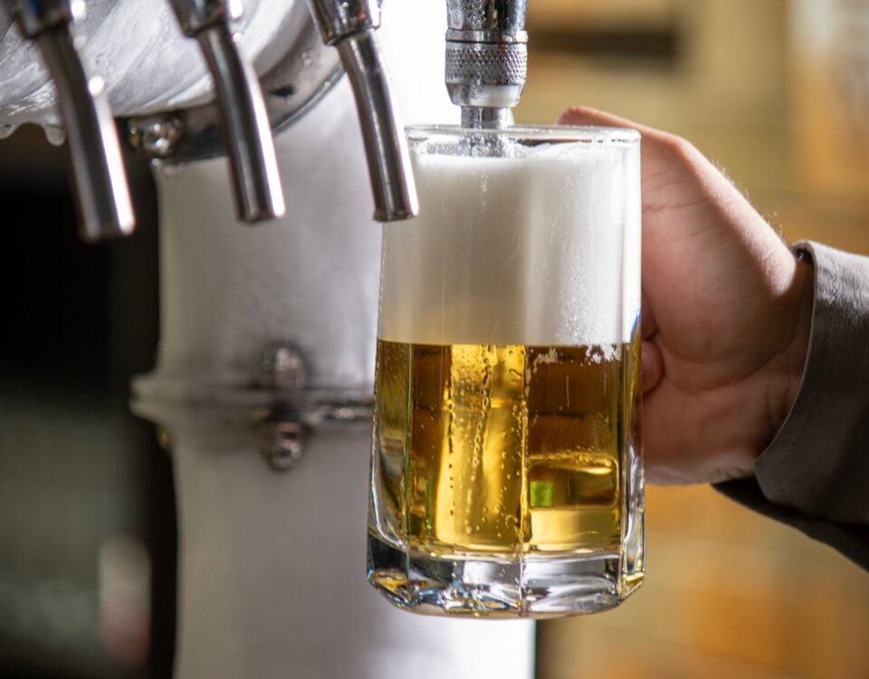 Fresh draught beer showing why drinks taste better from glass than plastic